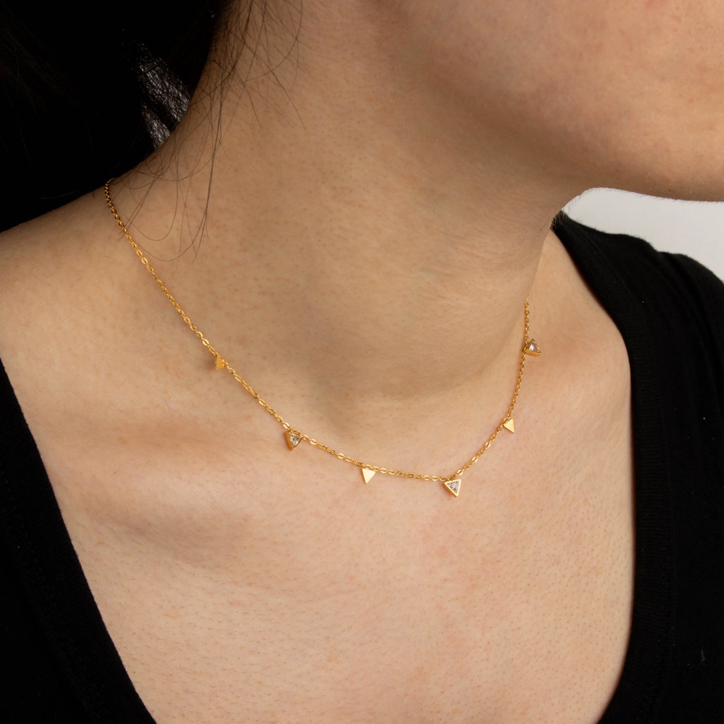Ajatine gold triangle necklace with crystal accents, dainty minimalist jewelry