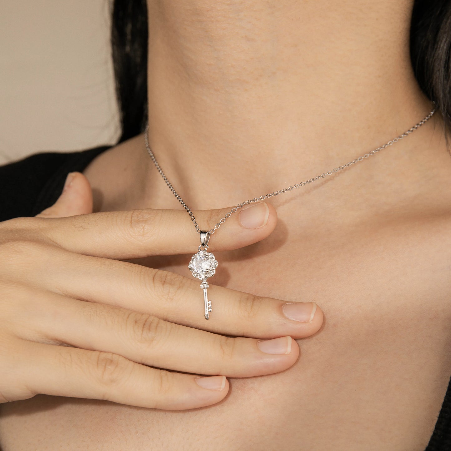 Ajatine silver cubic zircon key pendant necklace for women
