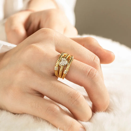 Ajatine gold heart stacking rings with crystals, elegant stackable ring set for women, vintage-inspired romantic jewelry.