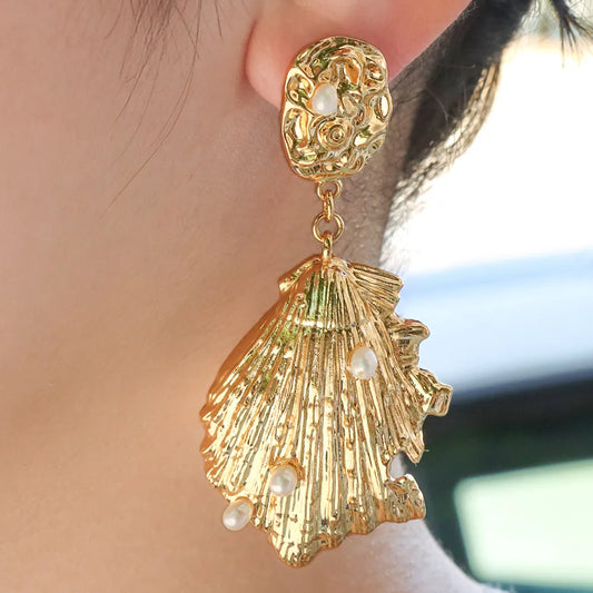 Ajatine gold seashell drop earrings with pearls, ocean-inspired statement jewelry for women
