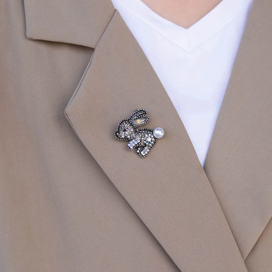 Ajatine rabbit brooch with crystals and pearl, elegant animal - shaped fashion accessory