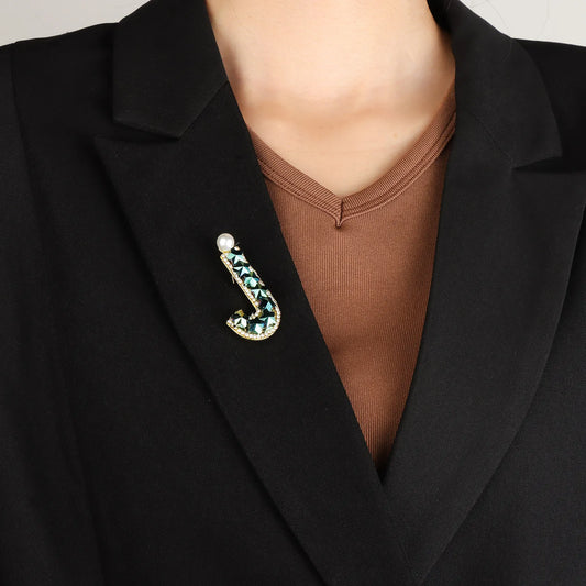 Ajatine letter J brooch with blue star crystals and a pearl, elegant fashion jewelry