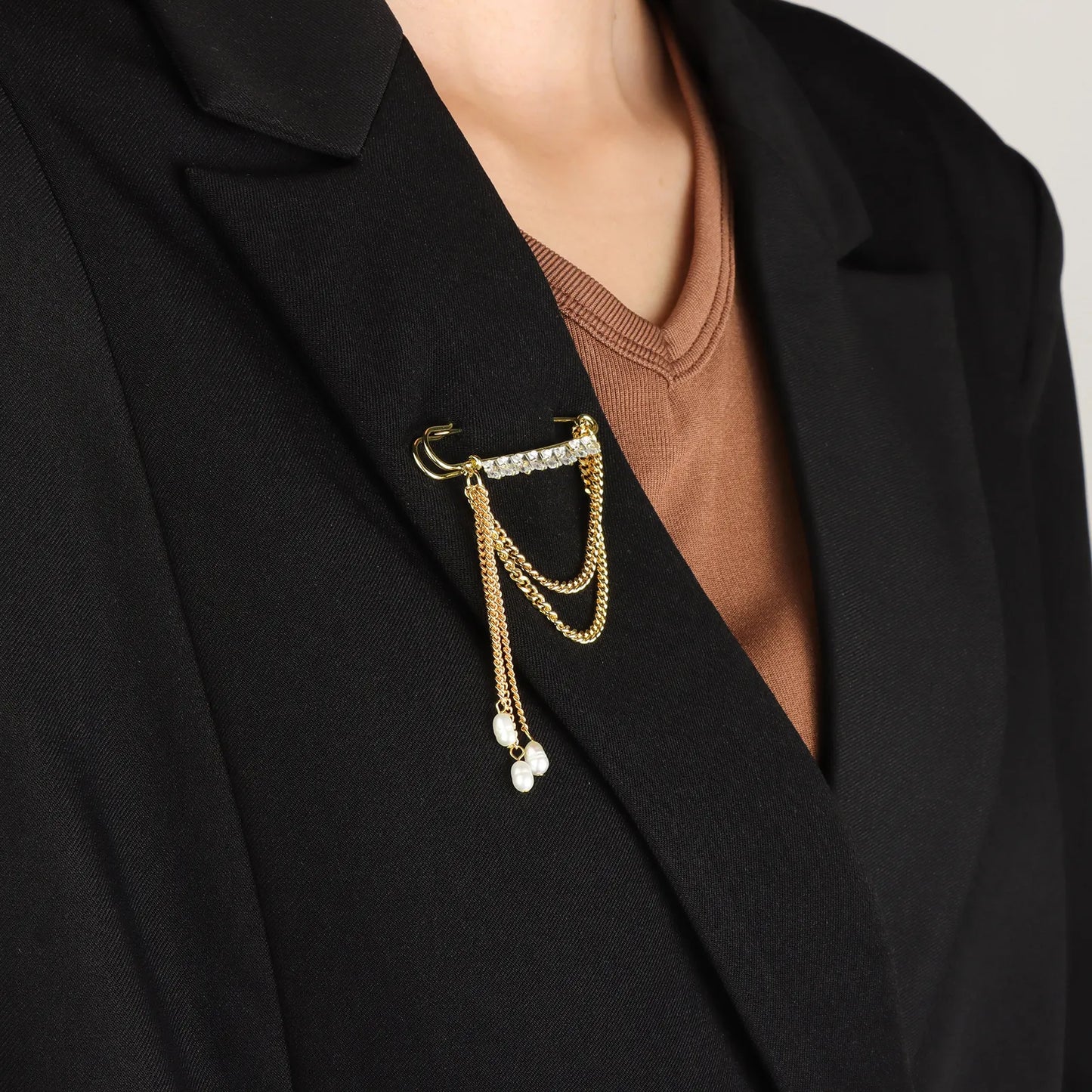 Ajatine safety pin brooch with crystals and pearl tassels, elegant fashion accessory