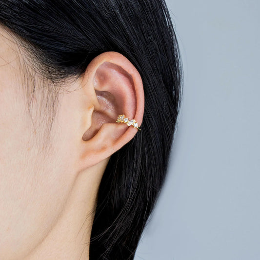 Unique irregular gold cuff earrings with zircon stones, adding artistic style to your look