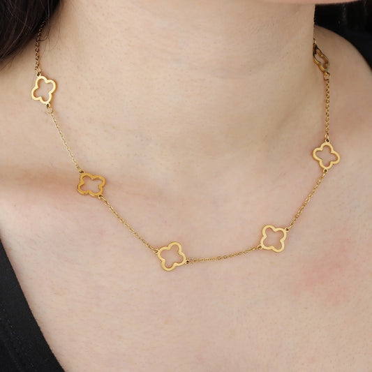 Ajatine gold clover necklace, hollow four leaf clover design