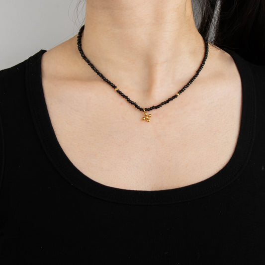 Ajatine black beaded gold cross pendant necklace for women