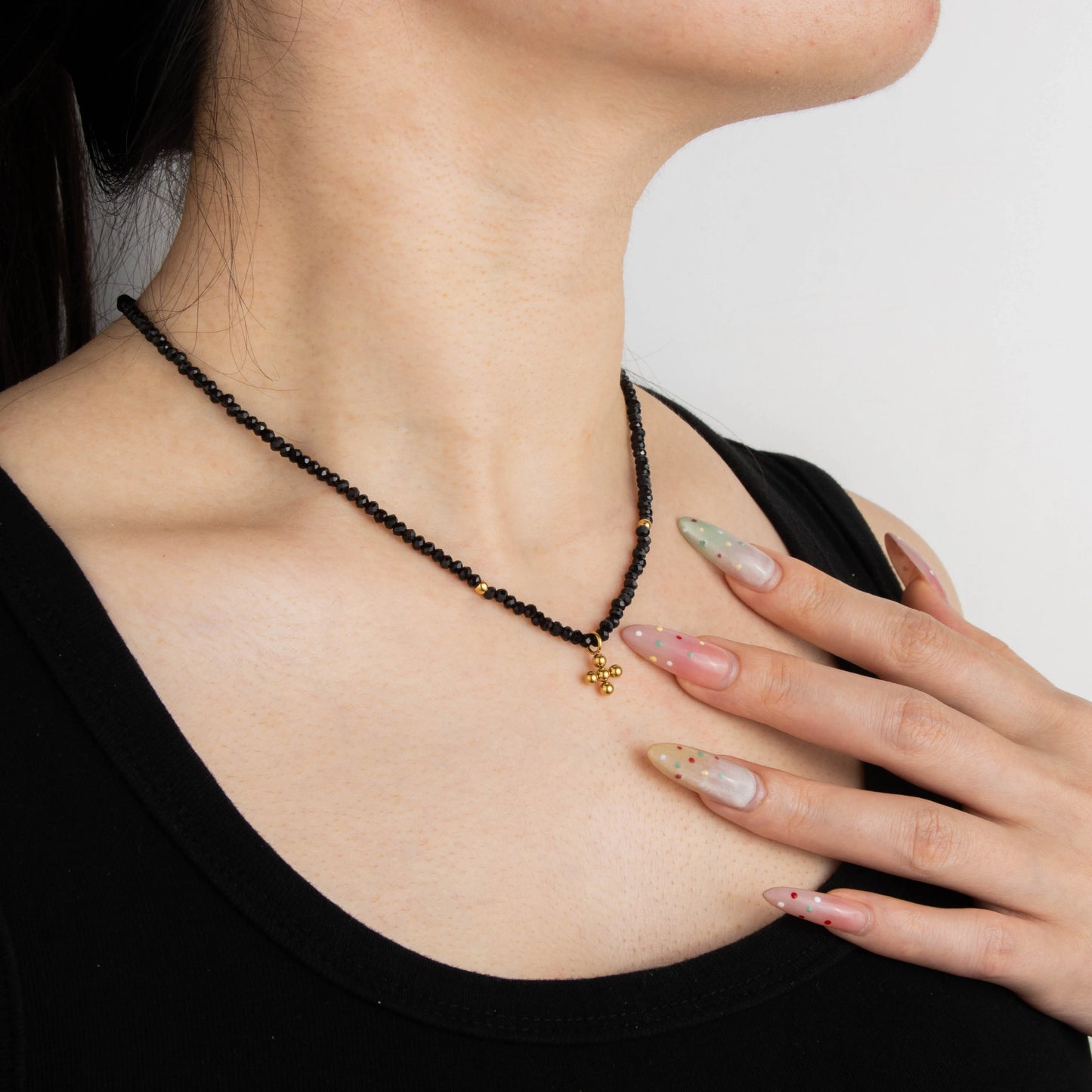 Ajatine black beaded gold cross pendant necklace for women