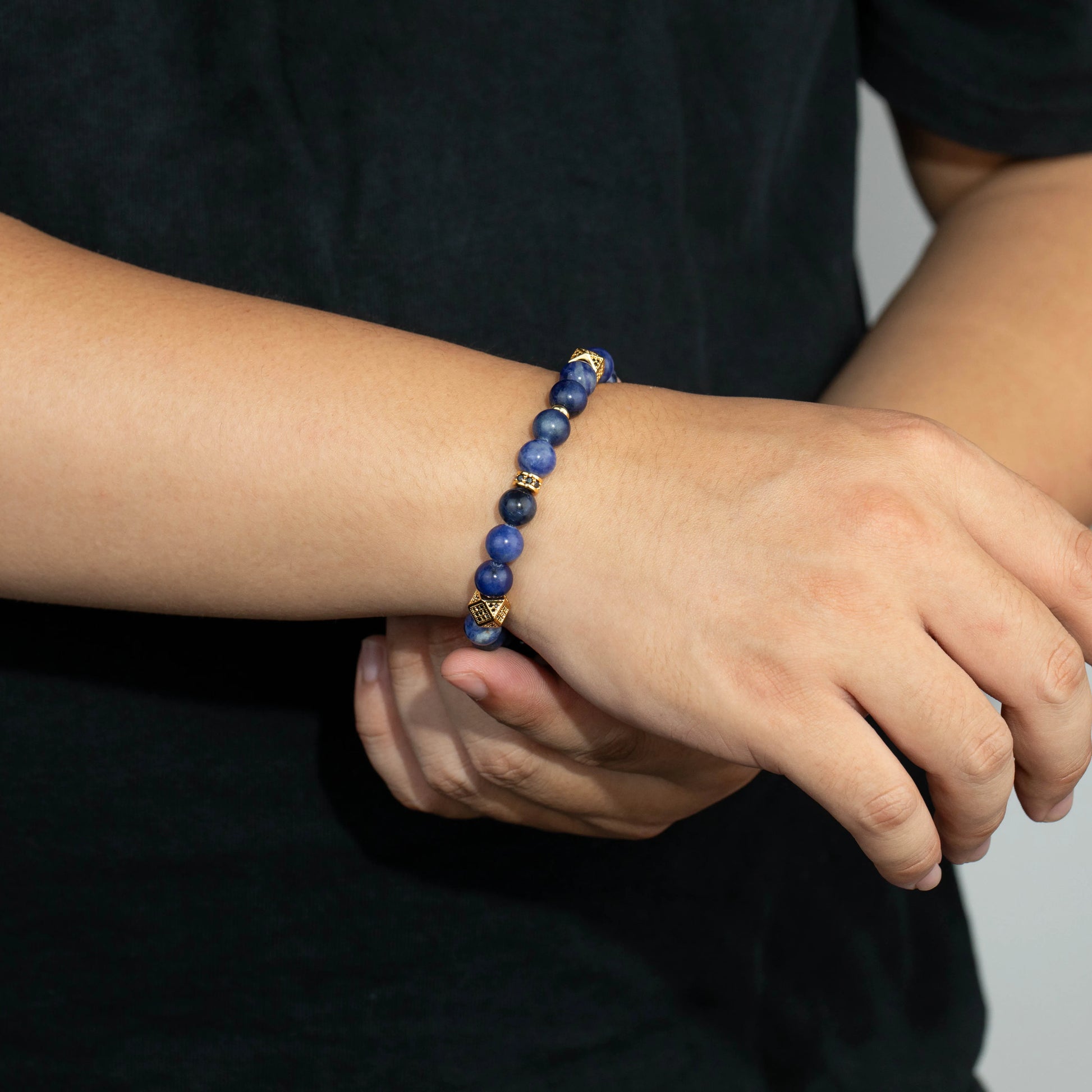 Ajatine blue natural stone beaded bracelet with gold accents