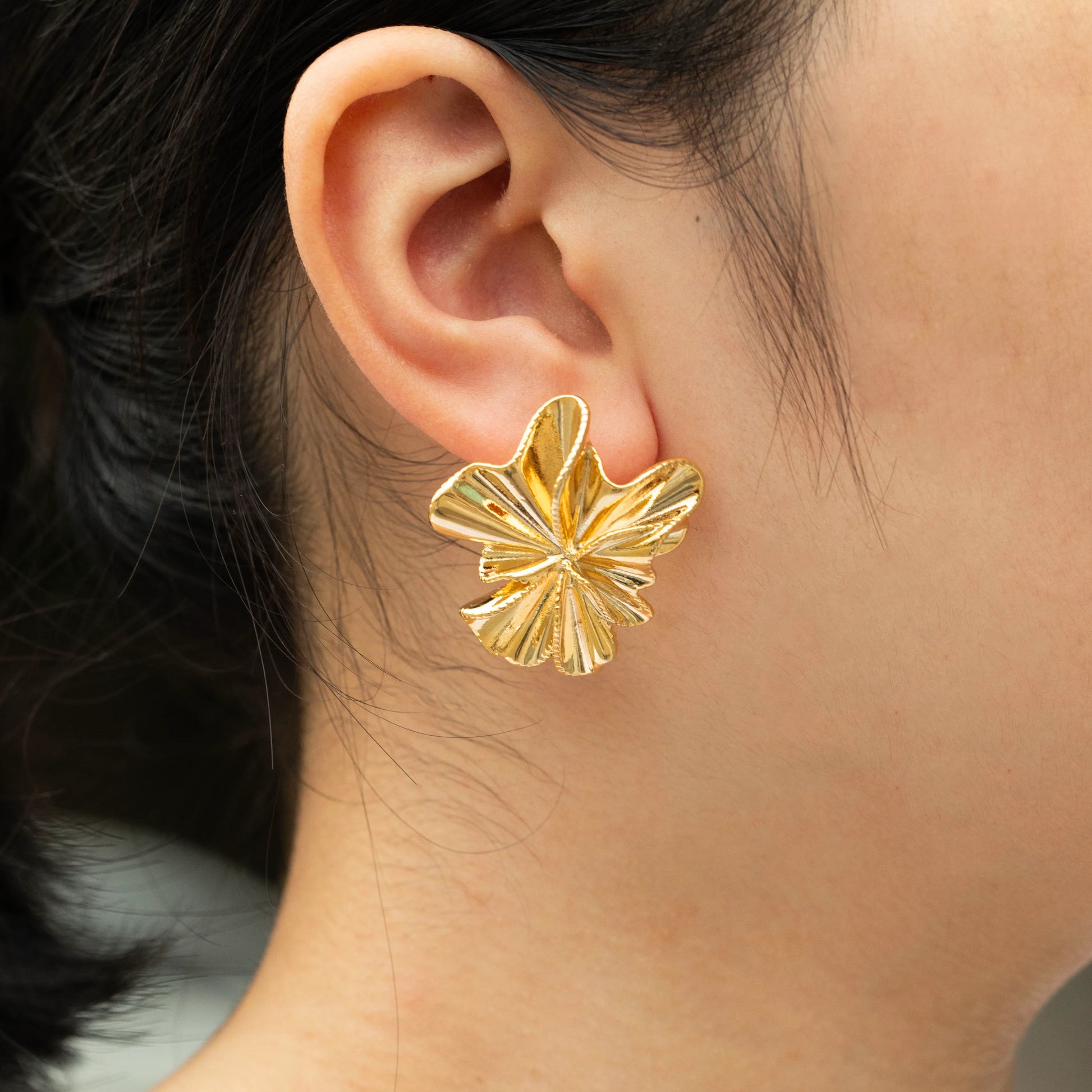 Ajatine bold flower statement earrings, gold floral studs for women, trendy special occasion jewelry