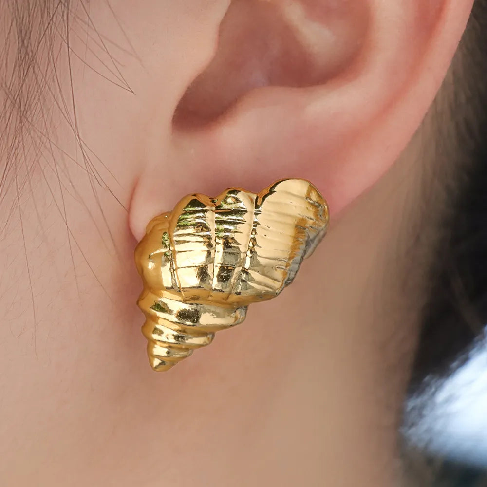 Ajatine gold conch earrings, beach inspired nautical jewelry for women