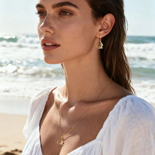 Ajatine crocodile jewelry set including necklace and earrings, a stylish animal shaped accessory combination