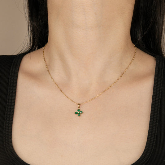 Ajatine four leaf clover necklace with gold chain and green crystal pendant