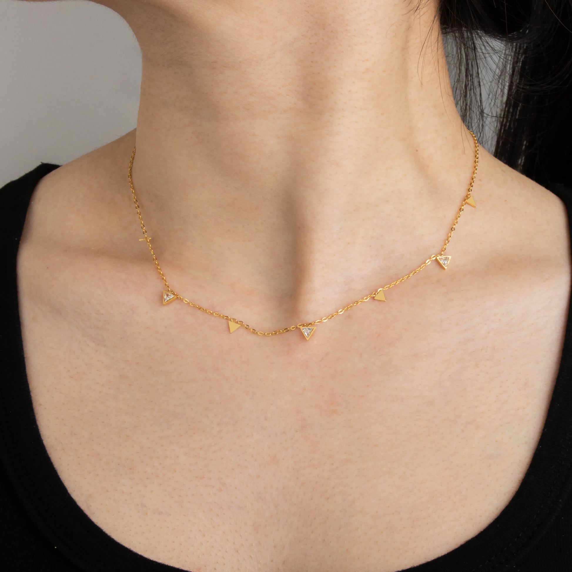 Ajatine gold triangle necklace with crystal accents, dainty minimalist jewelry