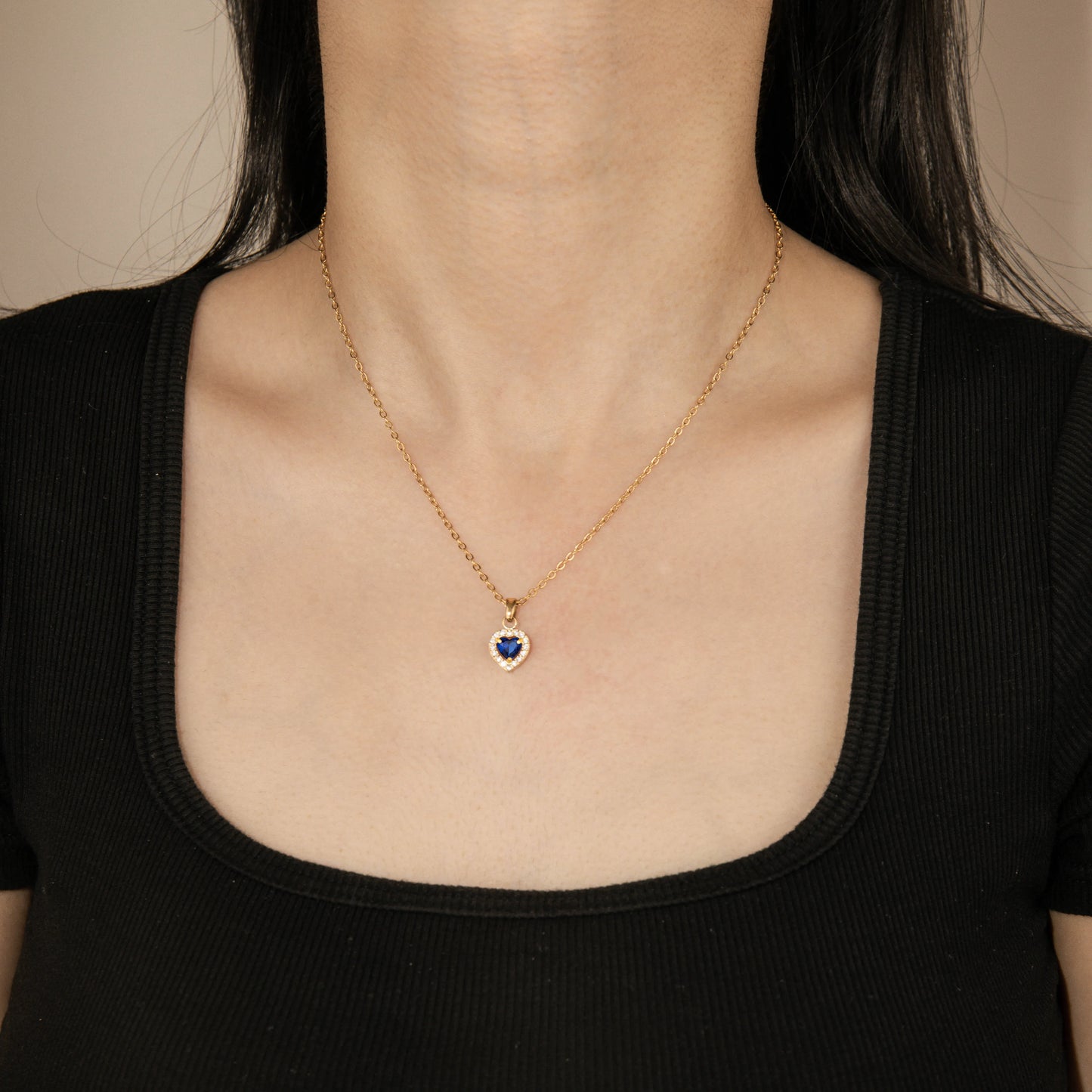 Heart shaped dark blue crystal gold necklace with cubic zircon pendant
