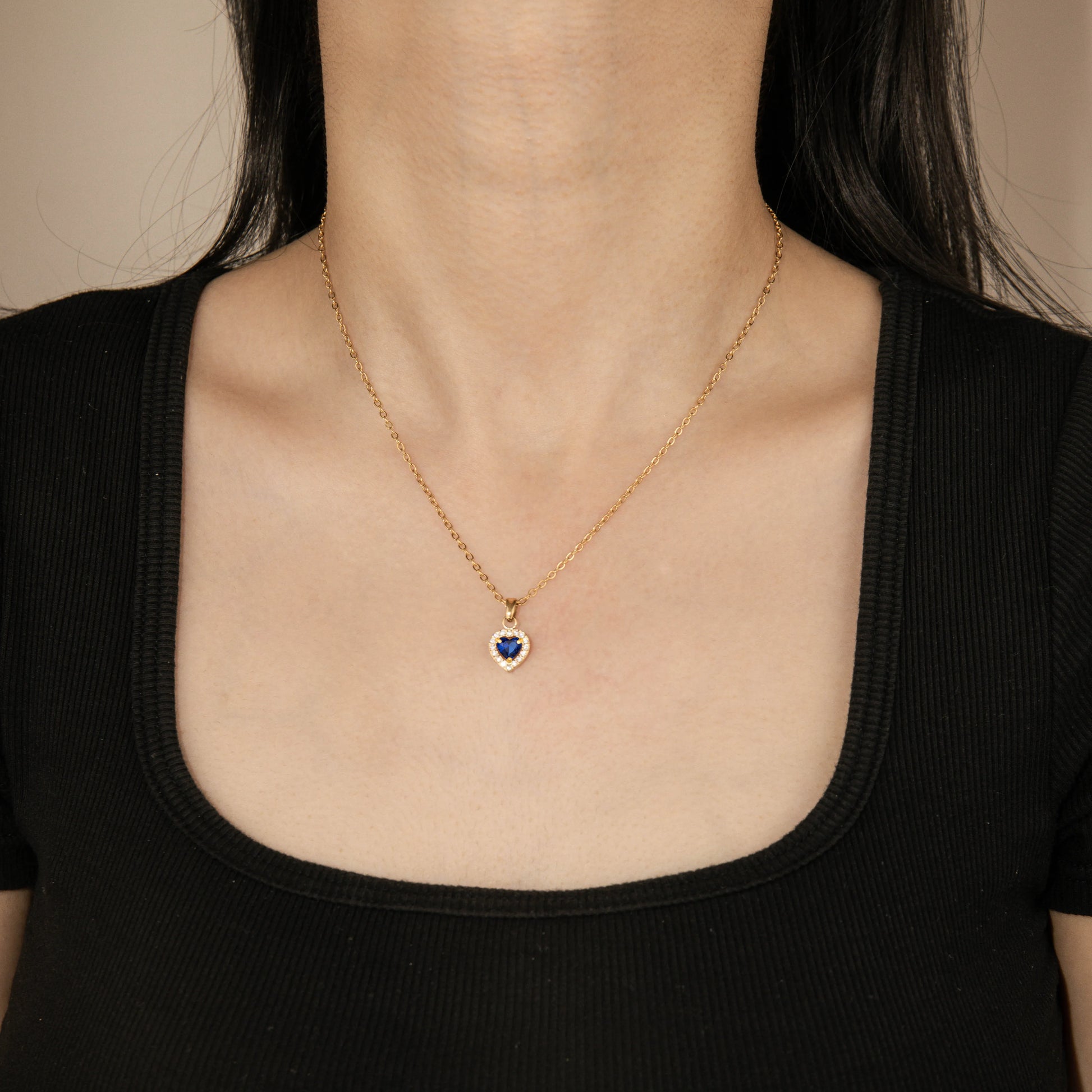 Heart shaped dark blue crystal gold necklace with cubic zircon pendant