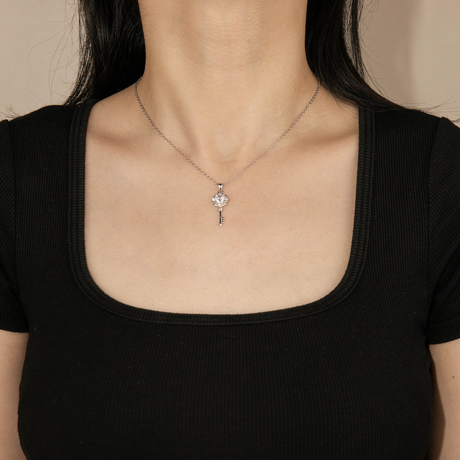 Ajatine silver cubic zircon key pendant necklace for women