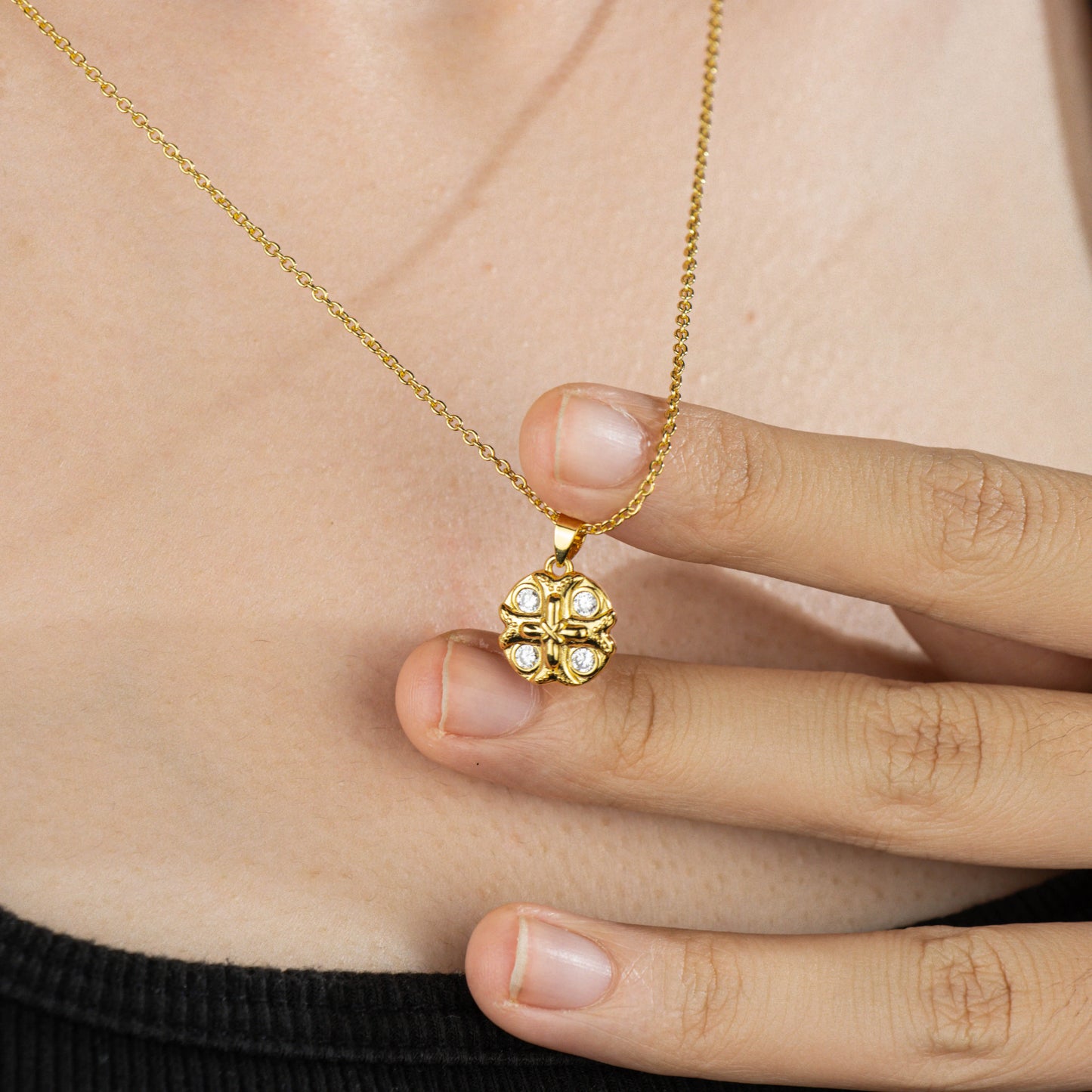Ajatine gold-tone brass cross pendant necklace with four sparkling zircon stones, dainty everyday religious jewelry