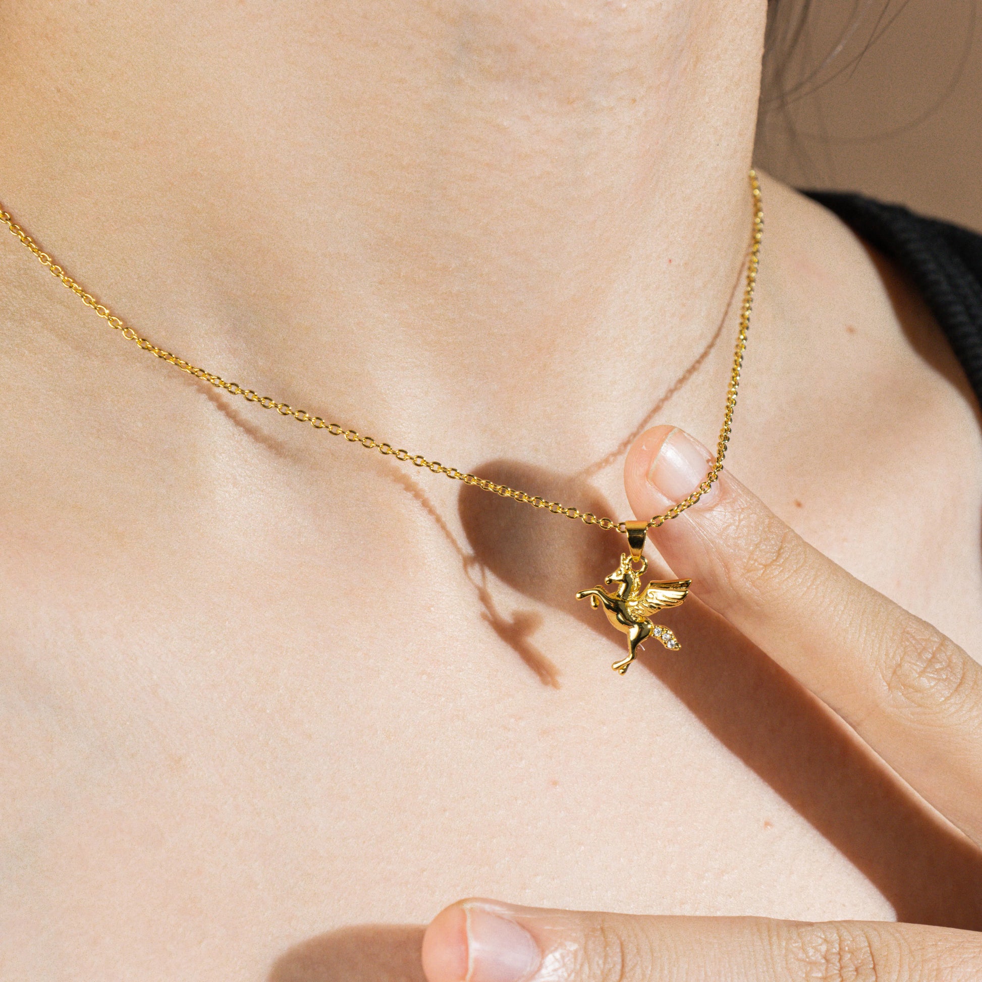 Ajatine gold pegasus pendant necklace made of brass and zircon, dainty mythical winged horse jewelry for women