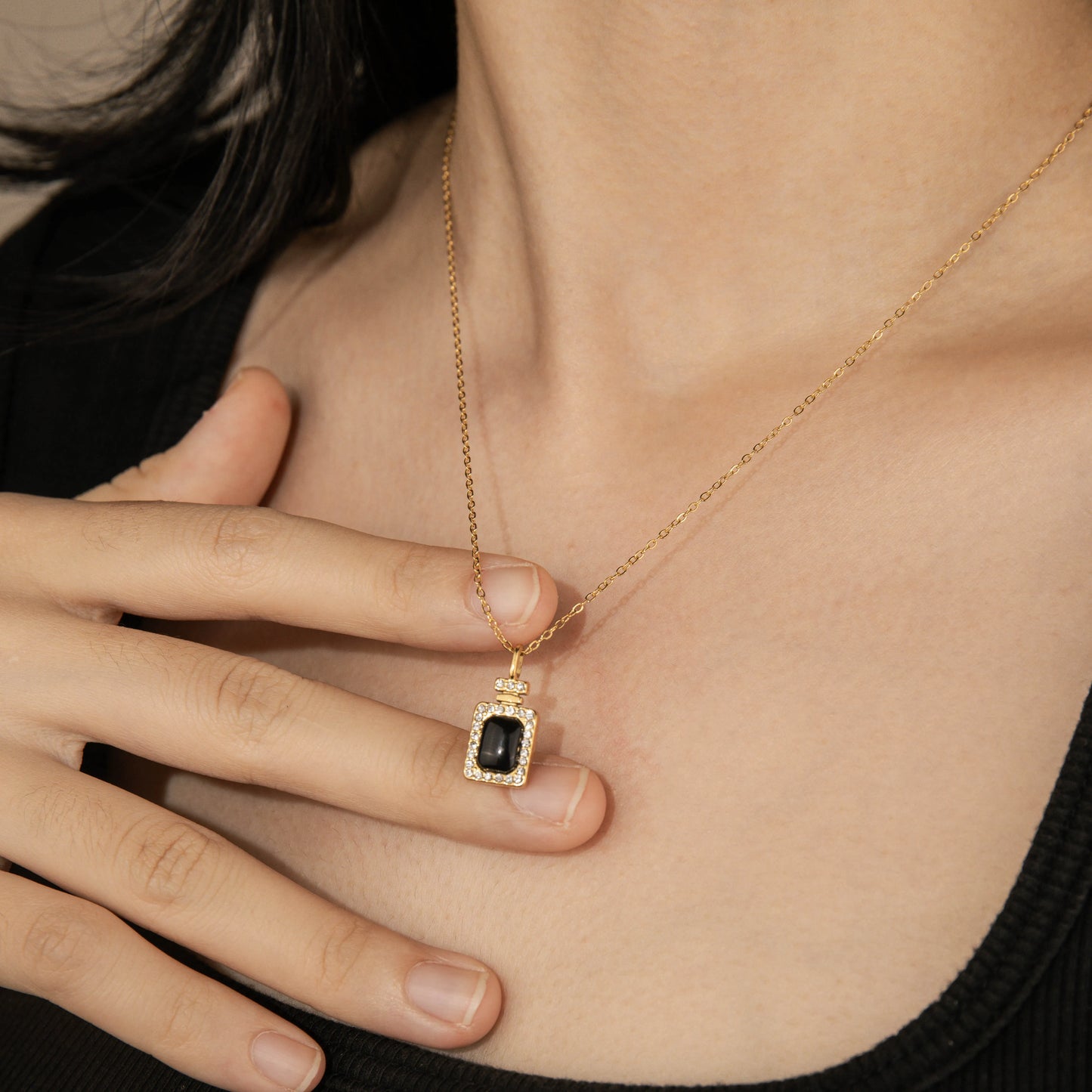 Ajatine gold square pendant necklace with black stone and cubic zircon