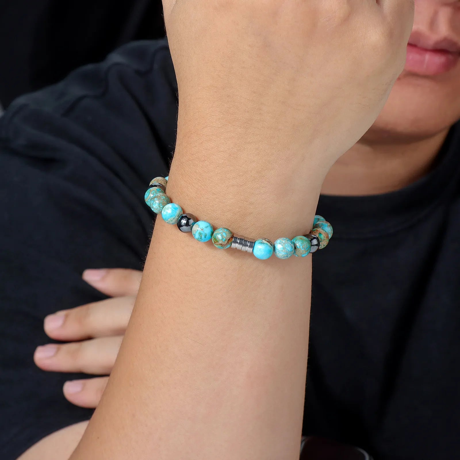 Bead bracelet with colorful stones and stainless steel detail, showcasing stylish design for daily wear.