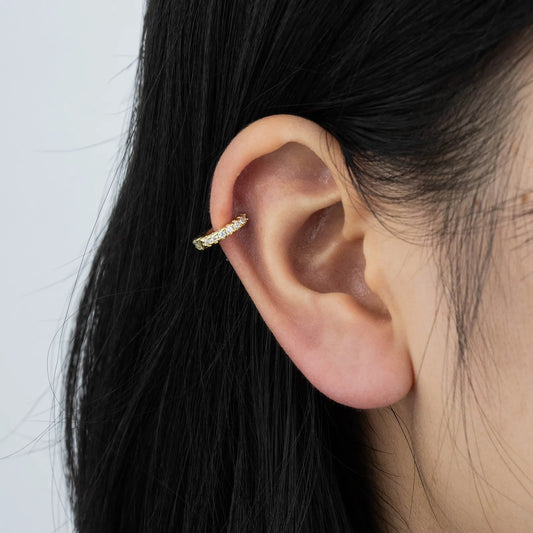 Ajatine chic gold hoop earrings with sparkling cubic zirconia stones, showcasing a delicate and stylish design for daily wear, catching light beautifully