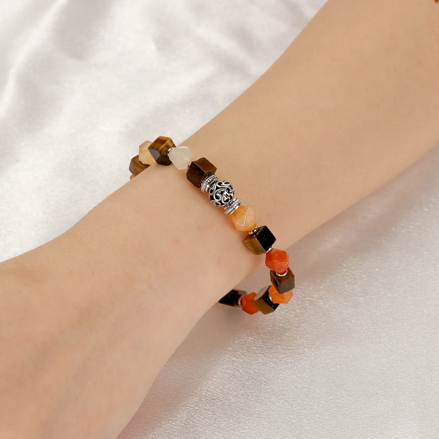 A colorful beaded bracelet with variously colored stones.
