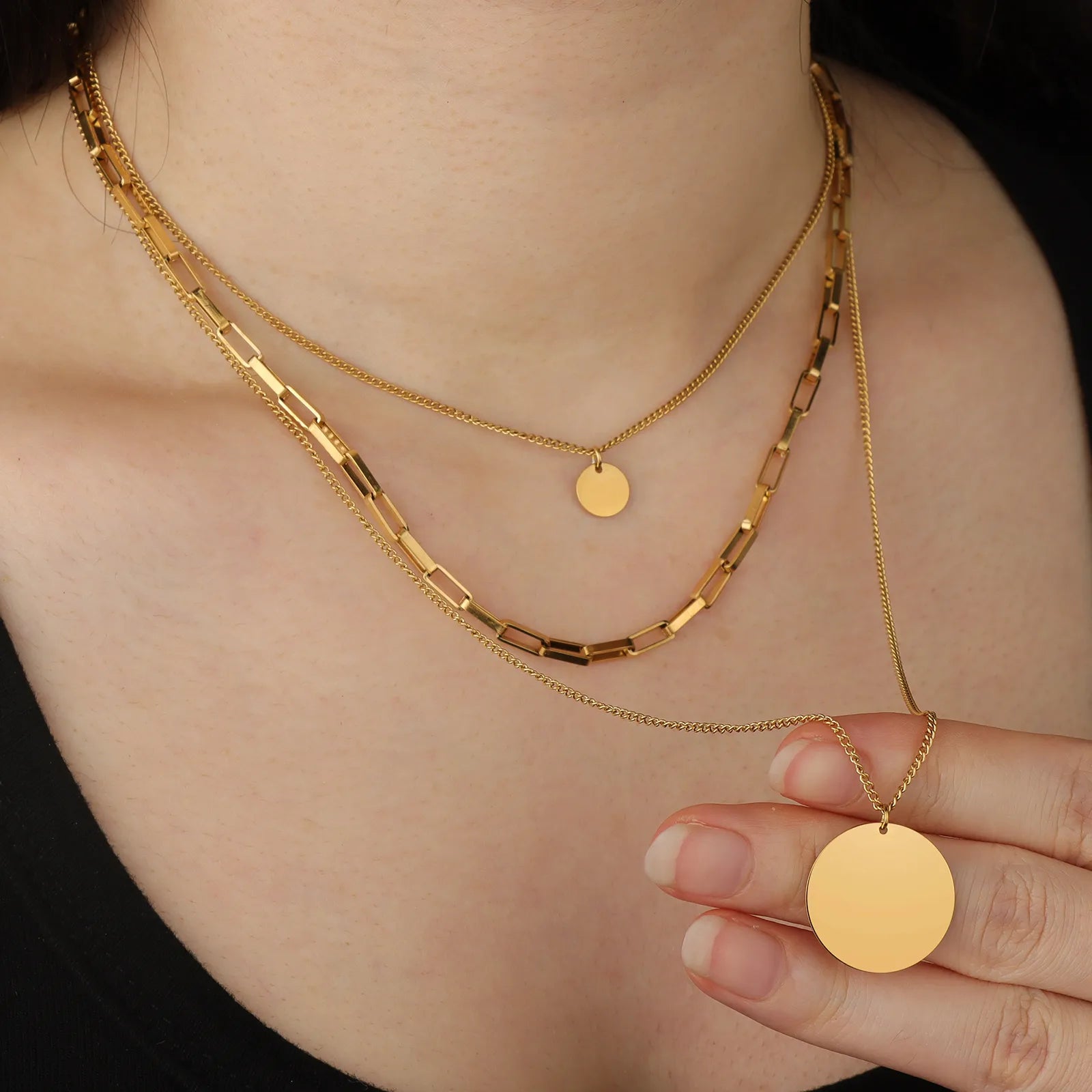 Ajatine gold layered necklace set with multi - strand chains and disc pendants
