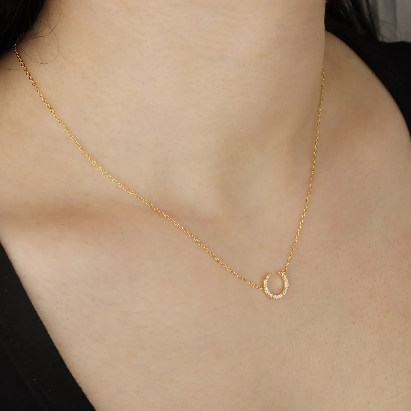 Ajatine gold crescent moon necklace with crystal, elegant minimalist jewelry