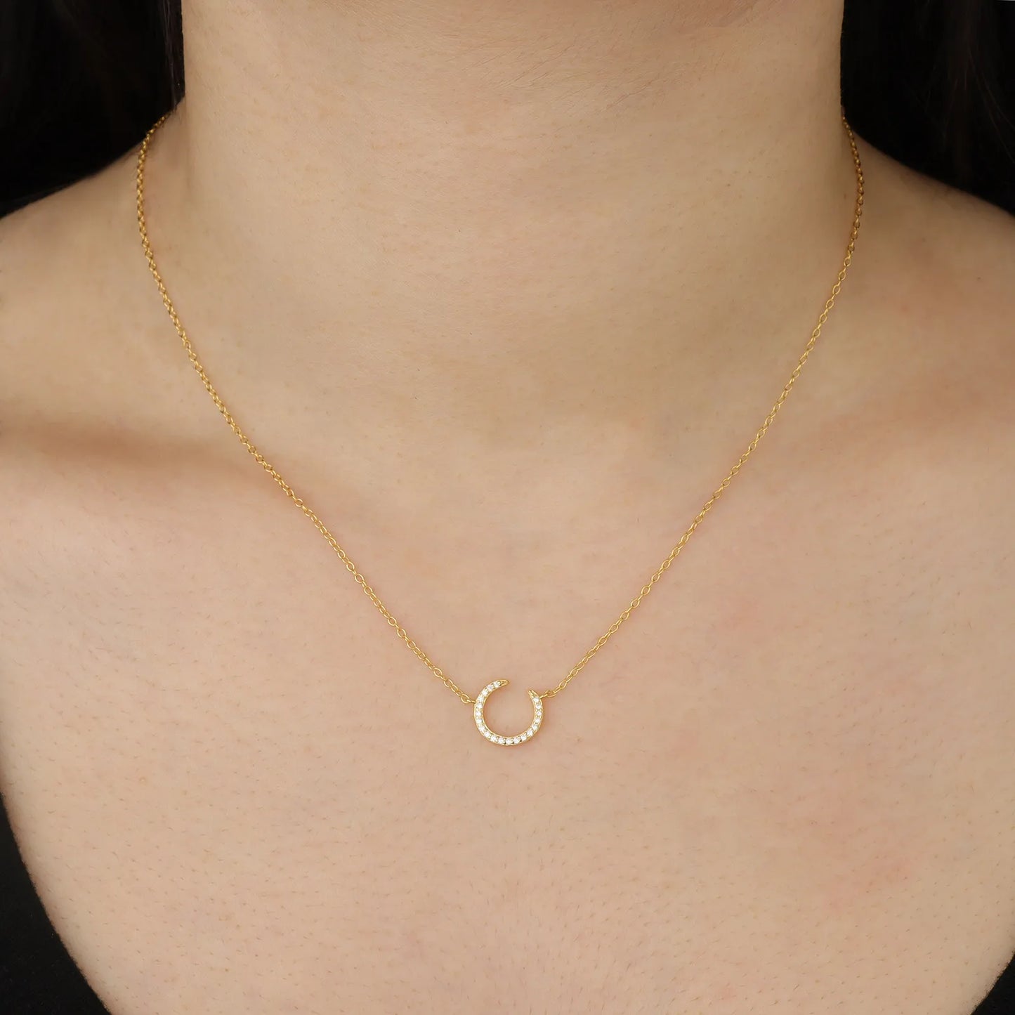 Ajatine gold crescent moon necklace with crystal, elegant minimalist jewelry
