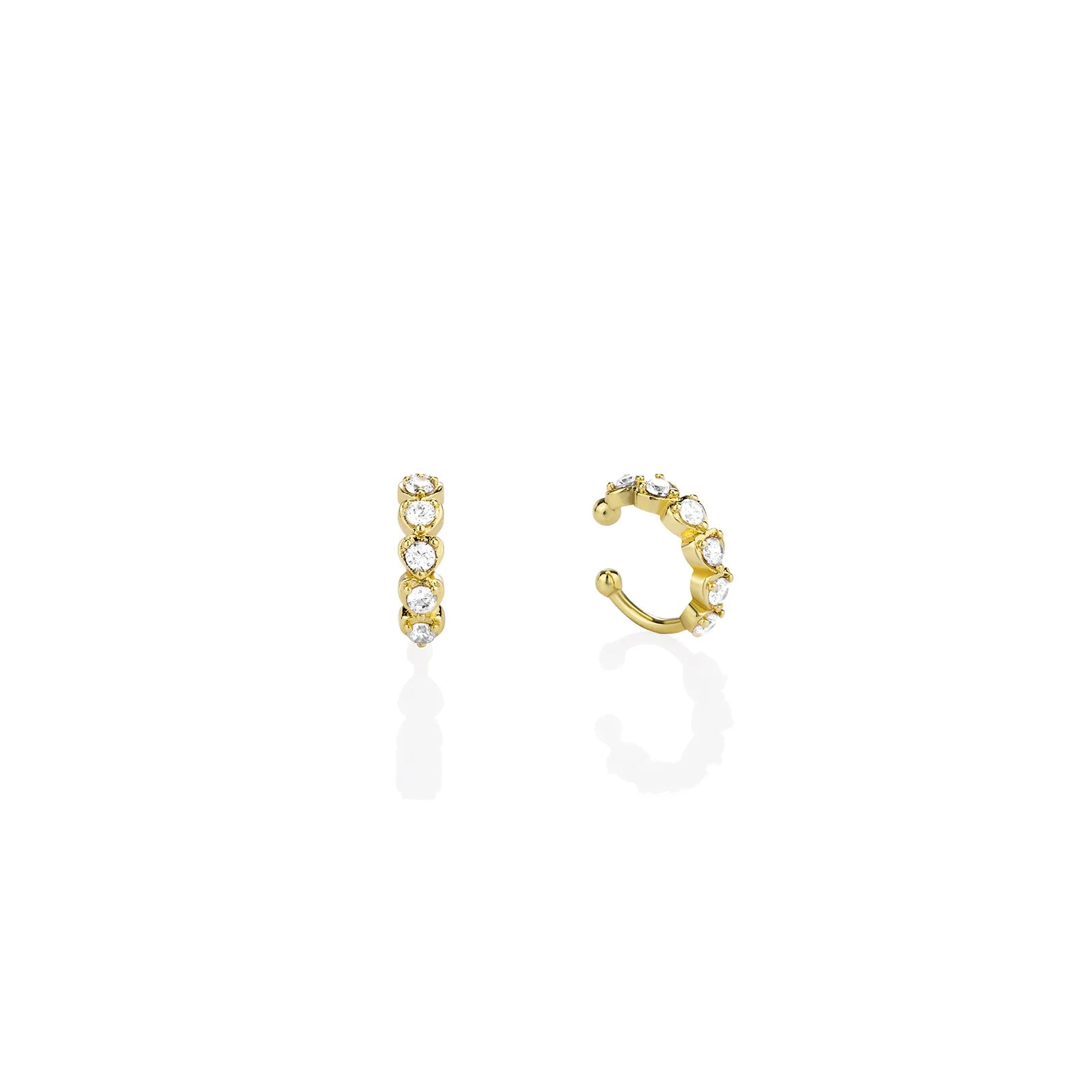 Pair of gold toned ear cuffs with cubic zirconia stones, showcasing a stylish and delicate design