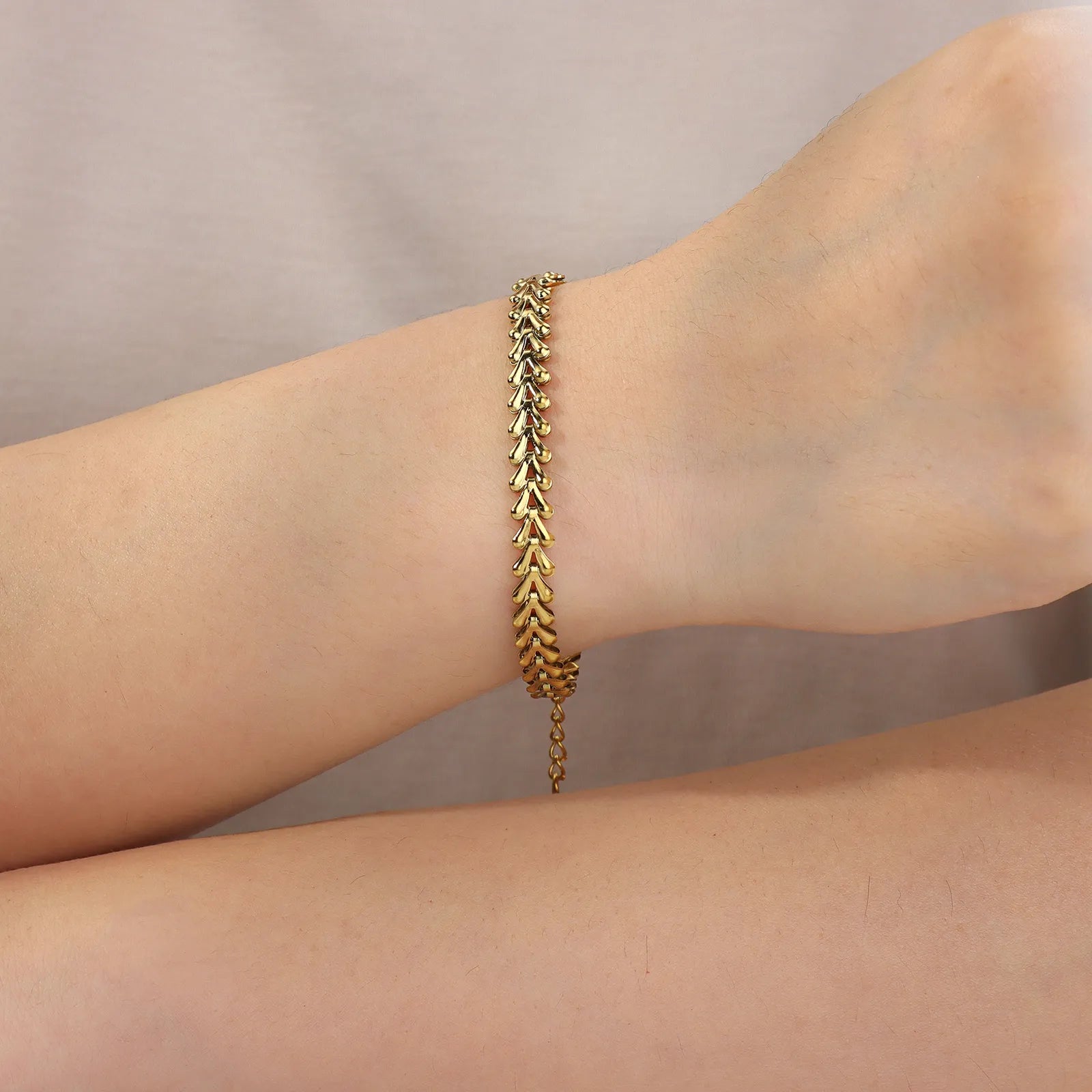 Gold adjustable bracelet, trendy chic jewelry for style.