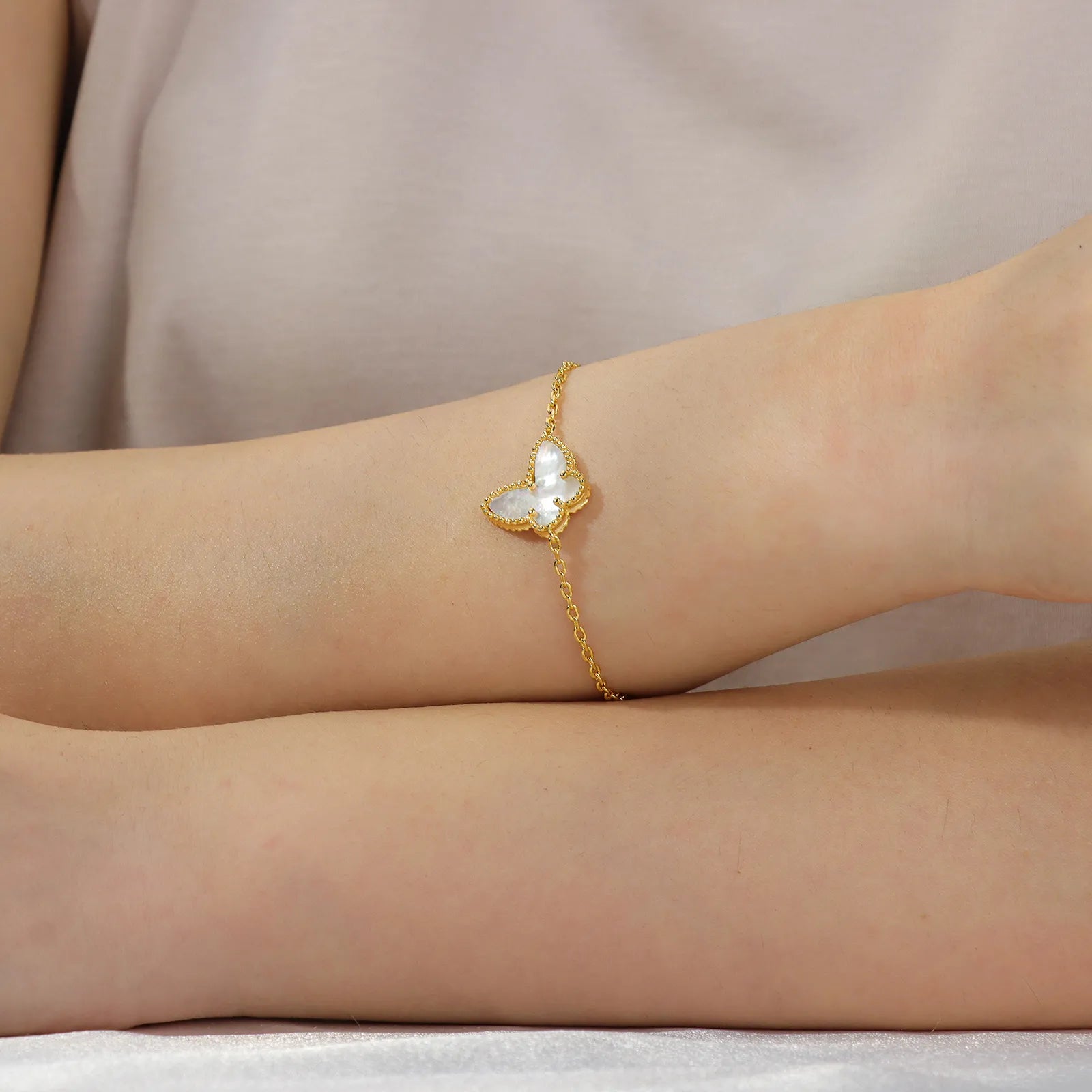 Ajatine gold butterfly bracelet with pearl, elegant jewelry for daily wear