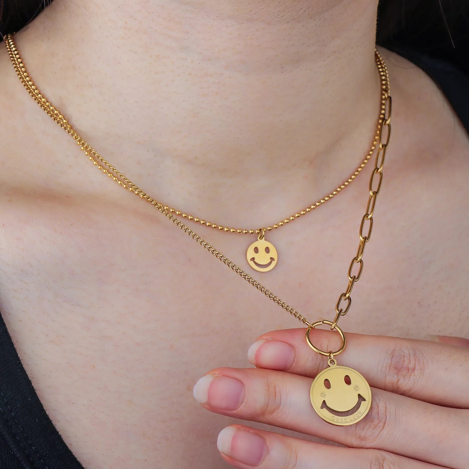 Ajatine gold double layer smiley face necklace, suitable for both daily wear and special occasions.