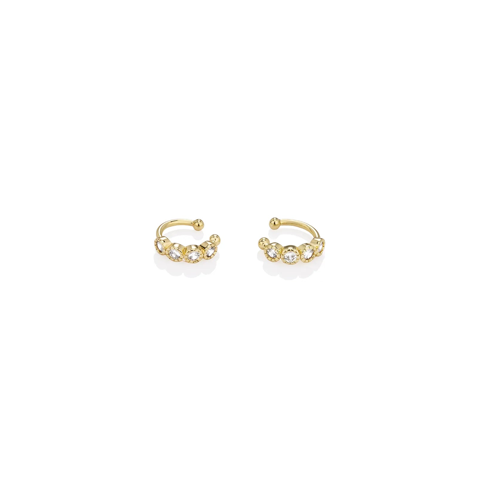 Ajatine gold ear cuffs adorned with zircon stones, perfect for stylish ear jewelry looks