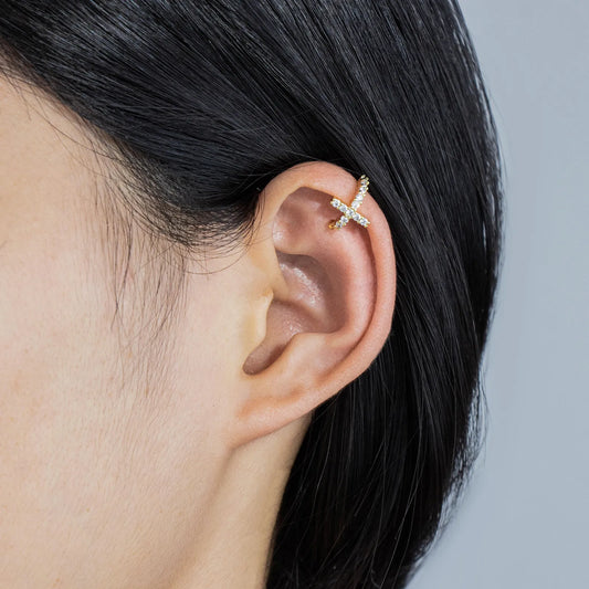 Ajatine asymmetric cross CZ ear cuffs in gold, featuring sparkling stones for elegant daily and party wear