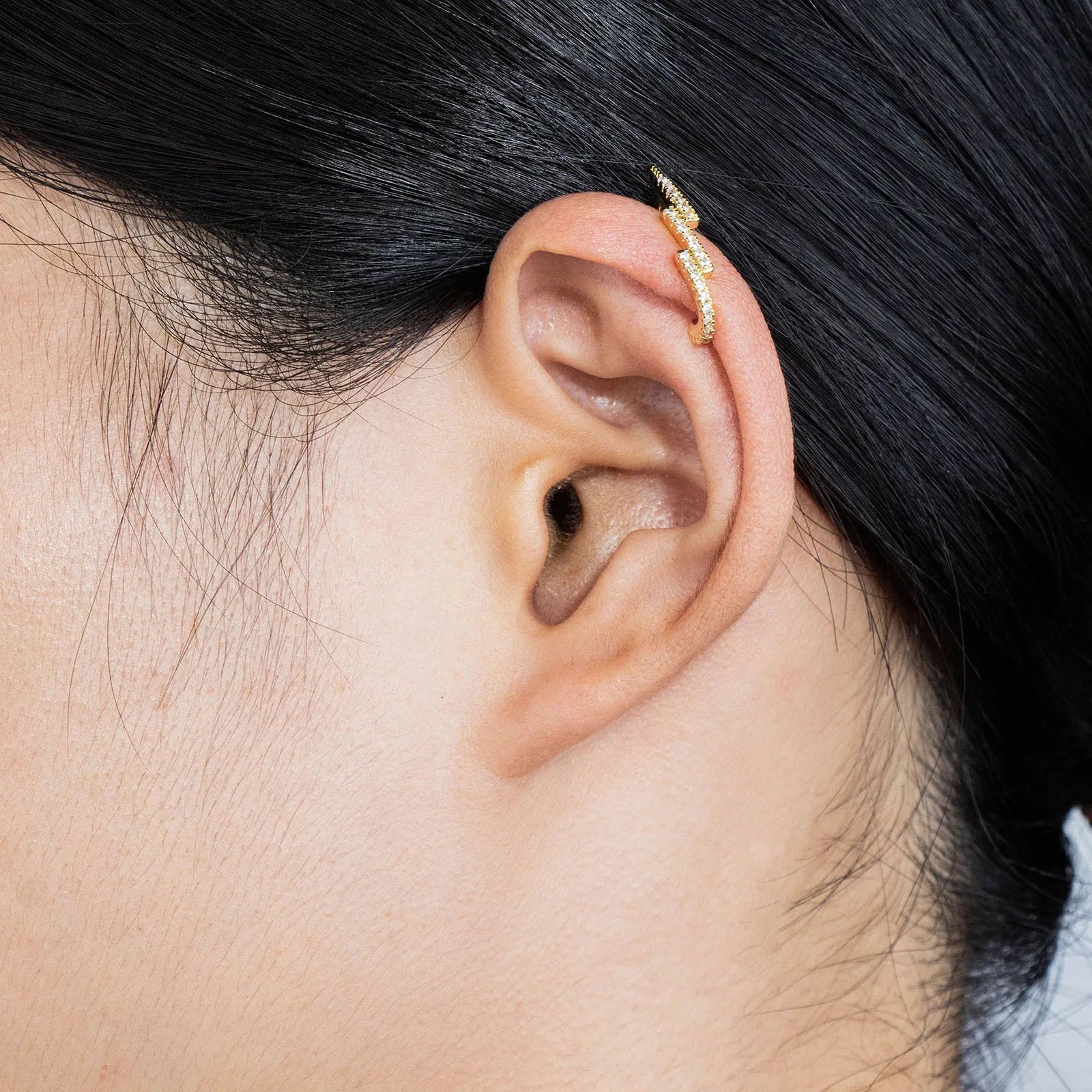 Ajatine Sparkling Zircon Cuff Earrings with gold tone design