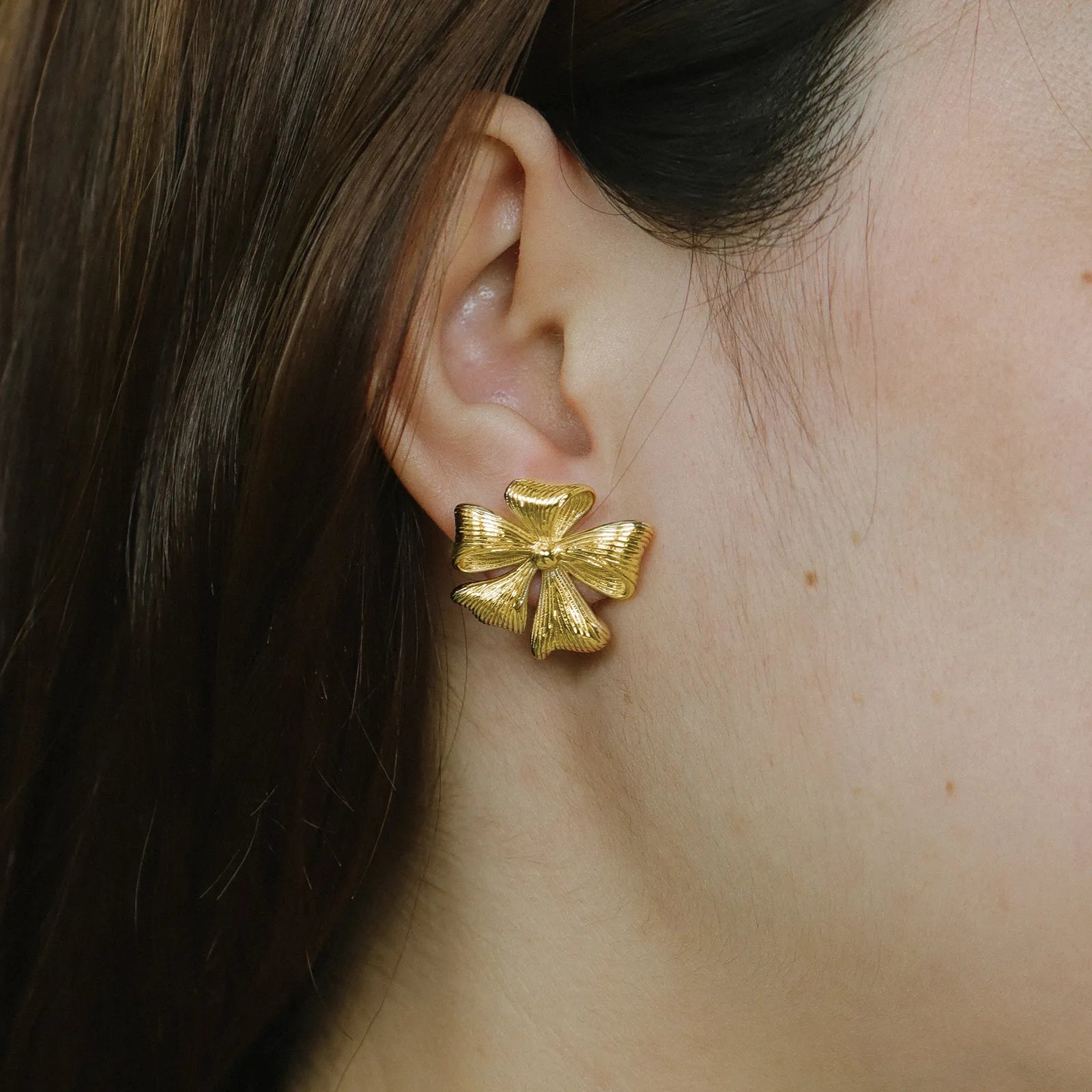 Gold Bow Stud Earrings Textured Ribbon Design