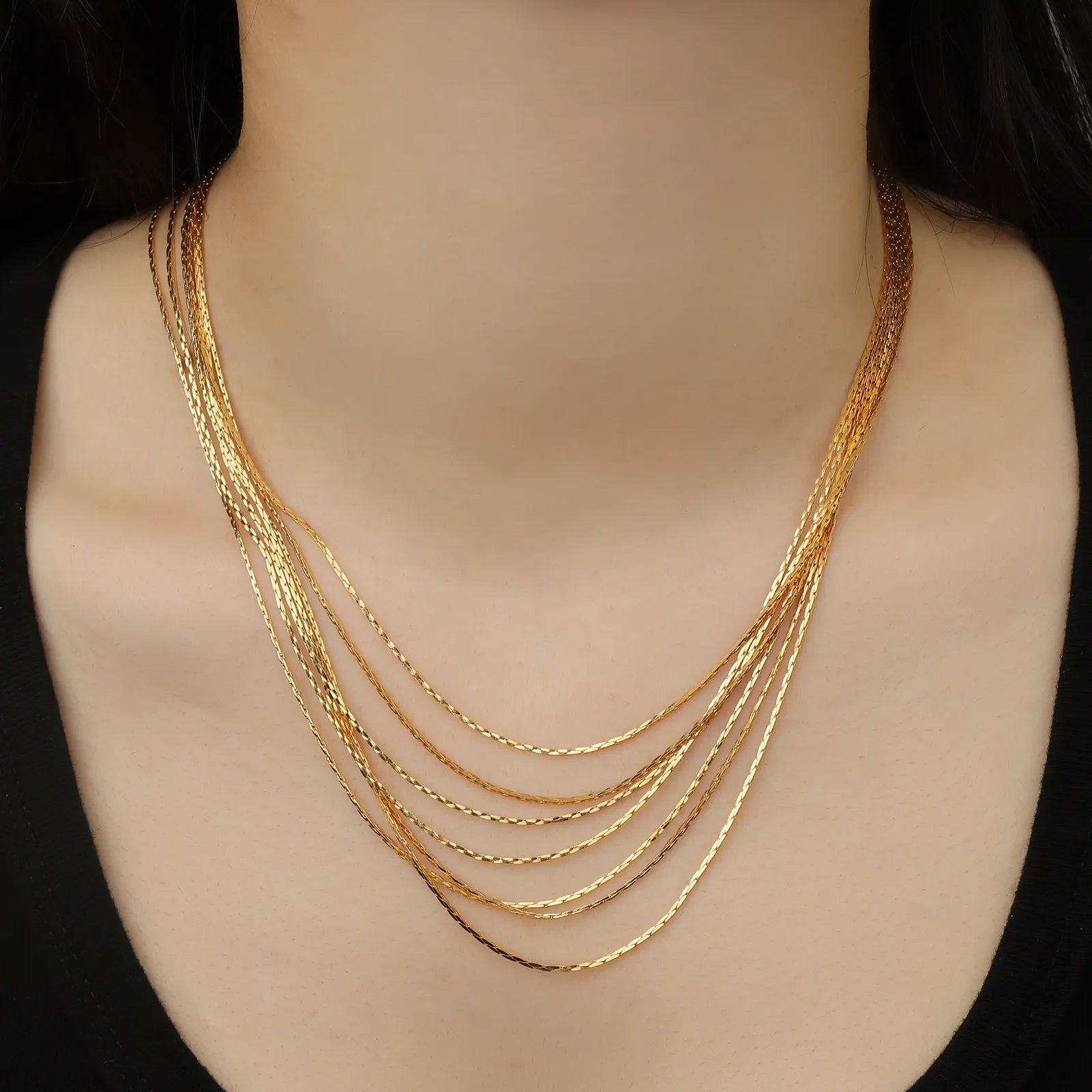 Ajatine gold layered necklace, statement jewelry for women.
