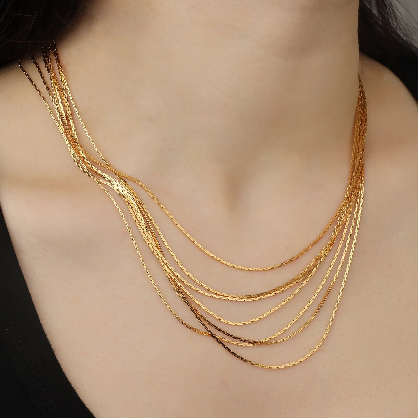 Ajatine gold layered necklace, statement jewelry for women.