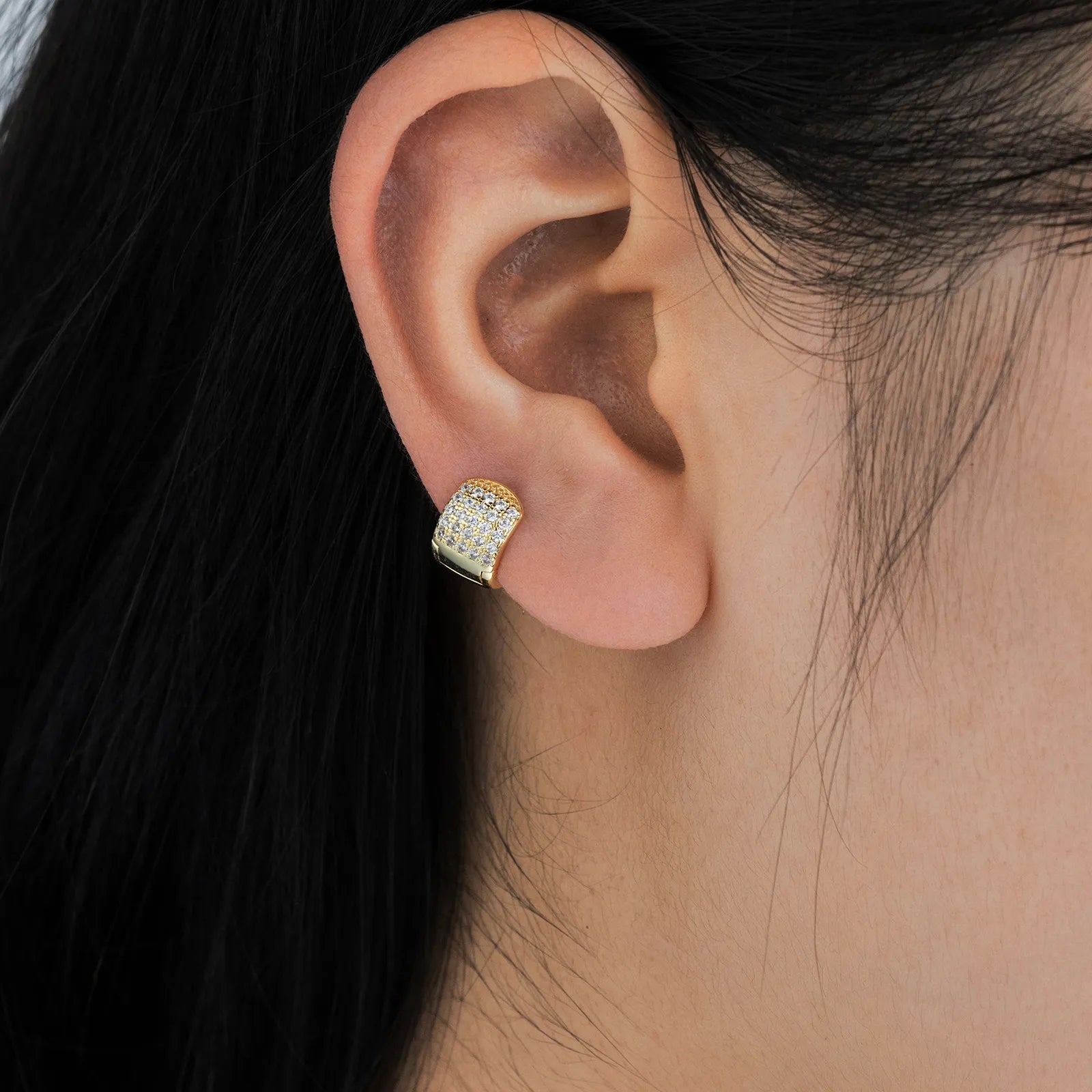 Ajatine brass huggie earrings with wax - set zircon, showcasing elegant design for daily and party wear
