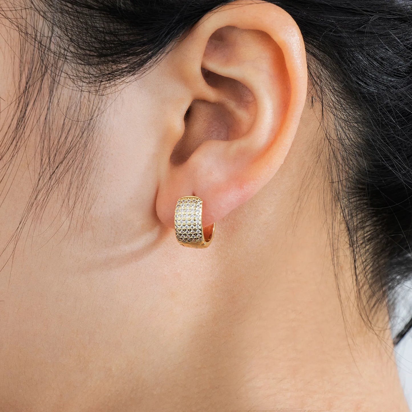 Ajatine brass huggie earrings with wax - set zircon, showcasing elegant design for daily and party wear