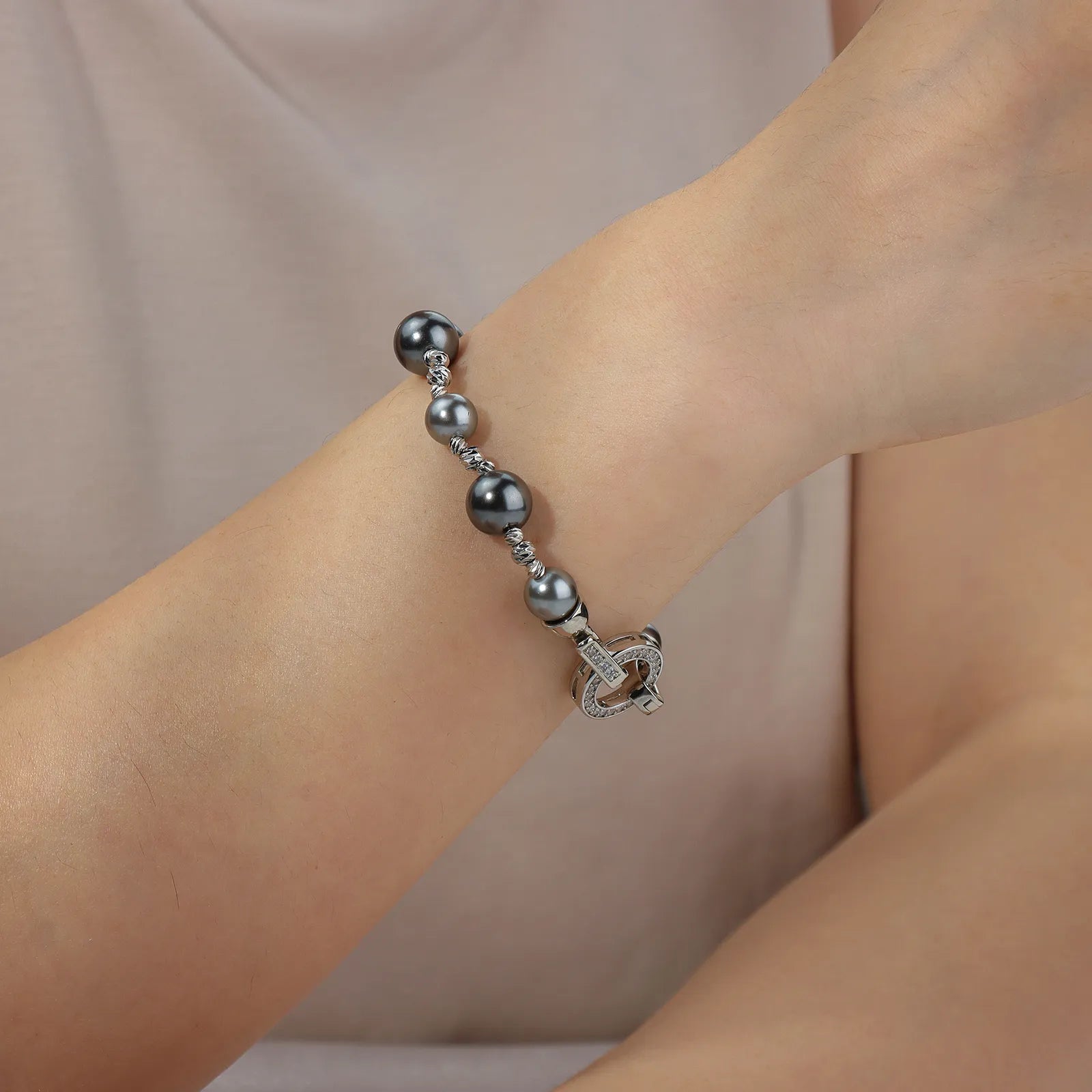 Ajatine pearl bracelet with zircon clasp, showcasing elegant jewelry