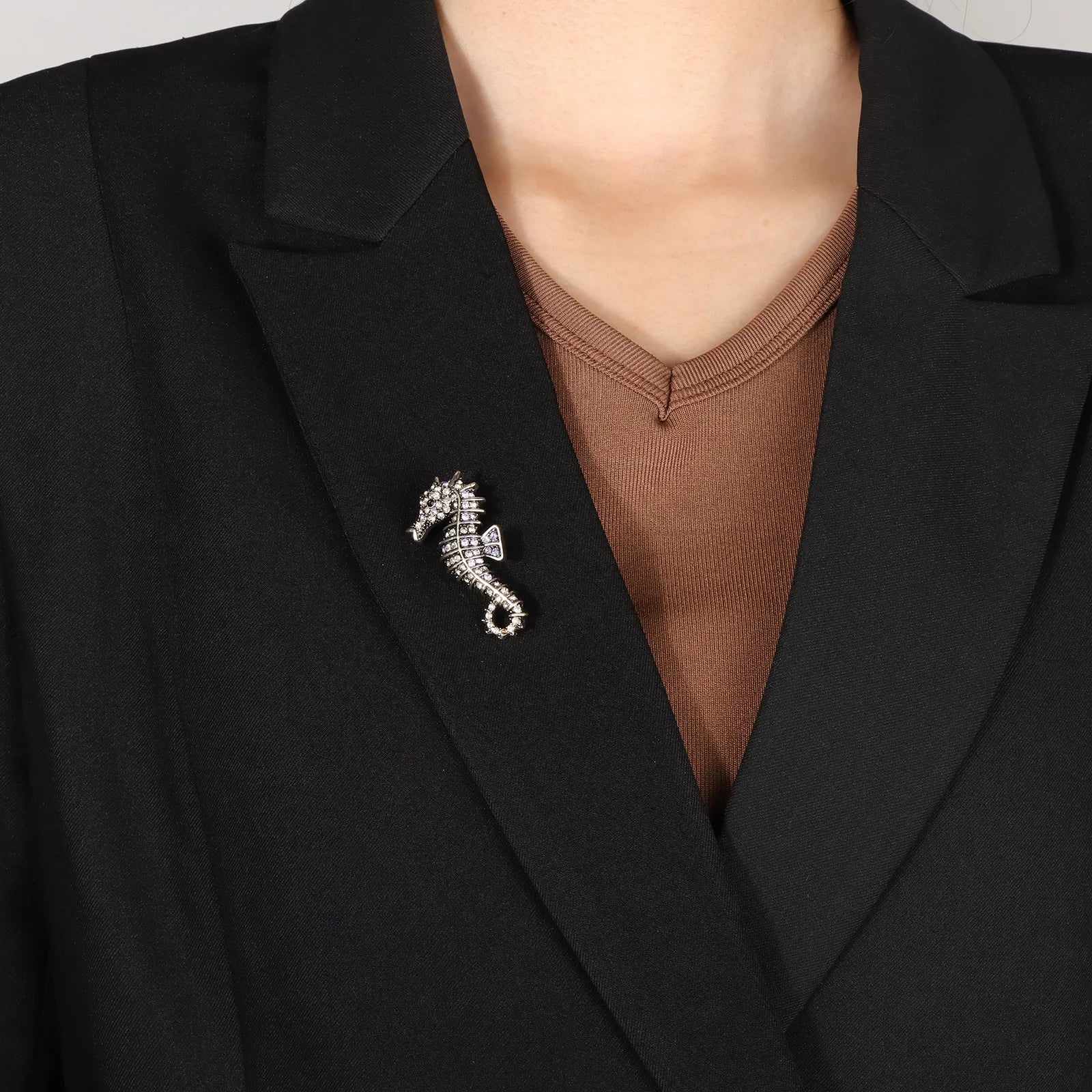 Ajatine vintage seahorse brooch with white and purple crystals
