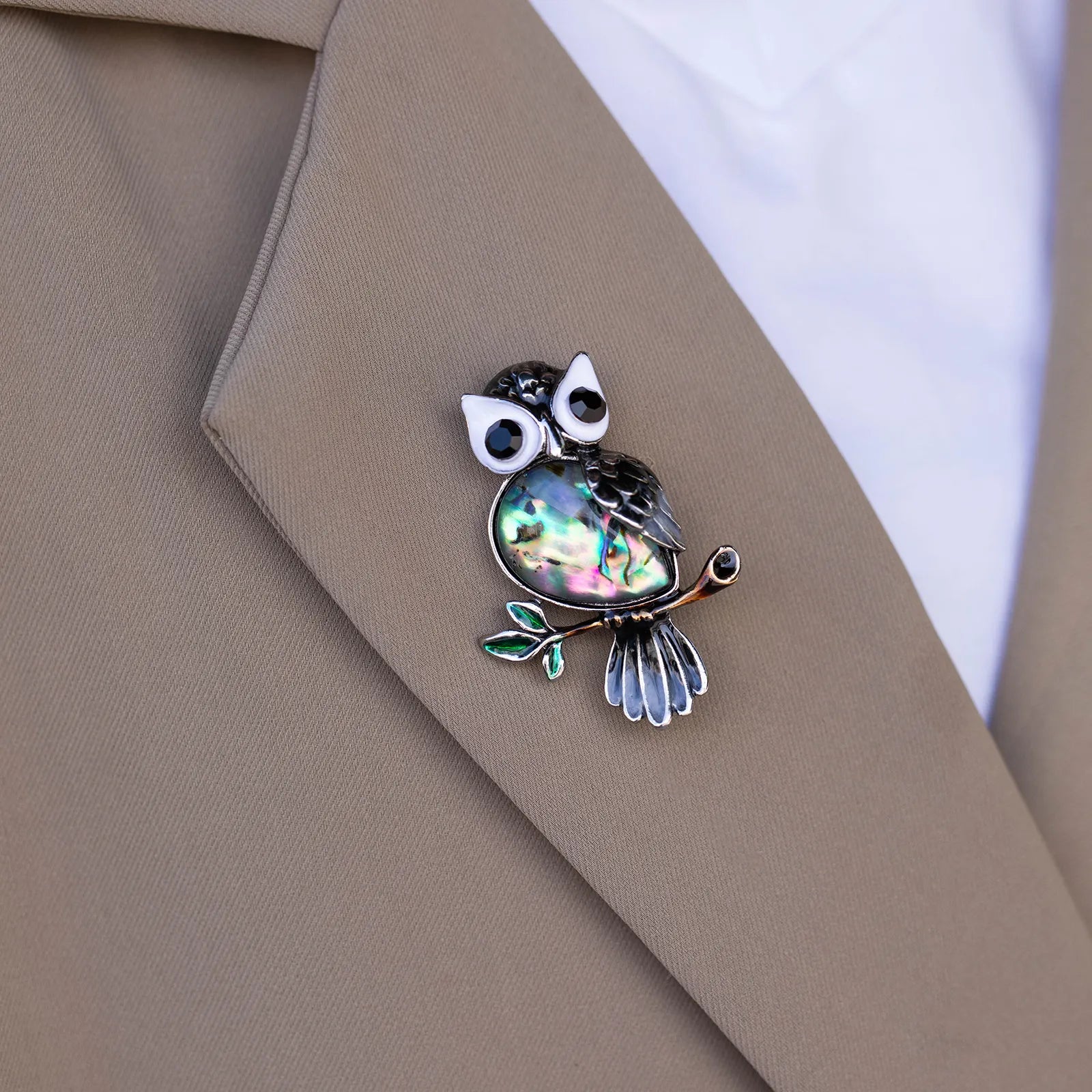 Ajatine owl brooch featuring abalone shell, vintage design, perfect for fashion accessorizing