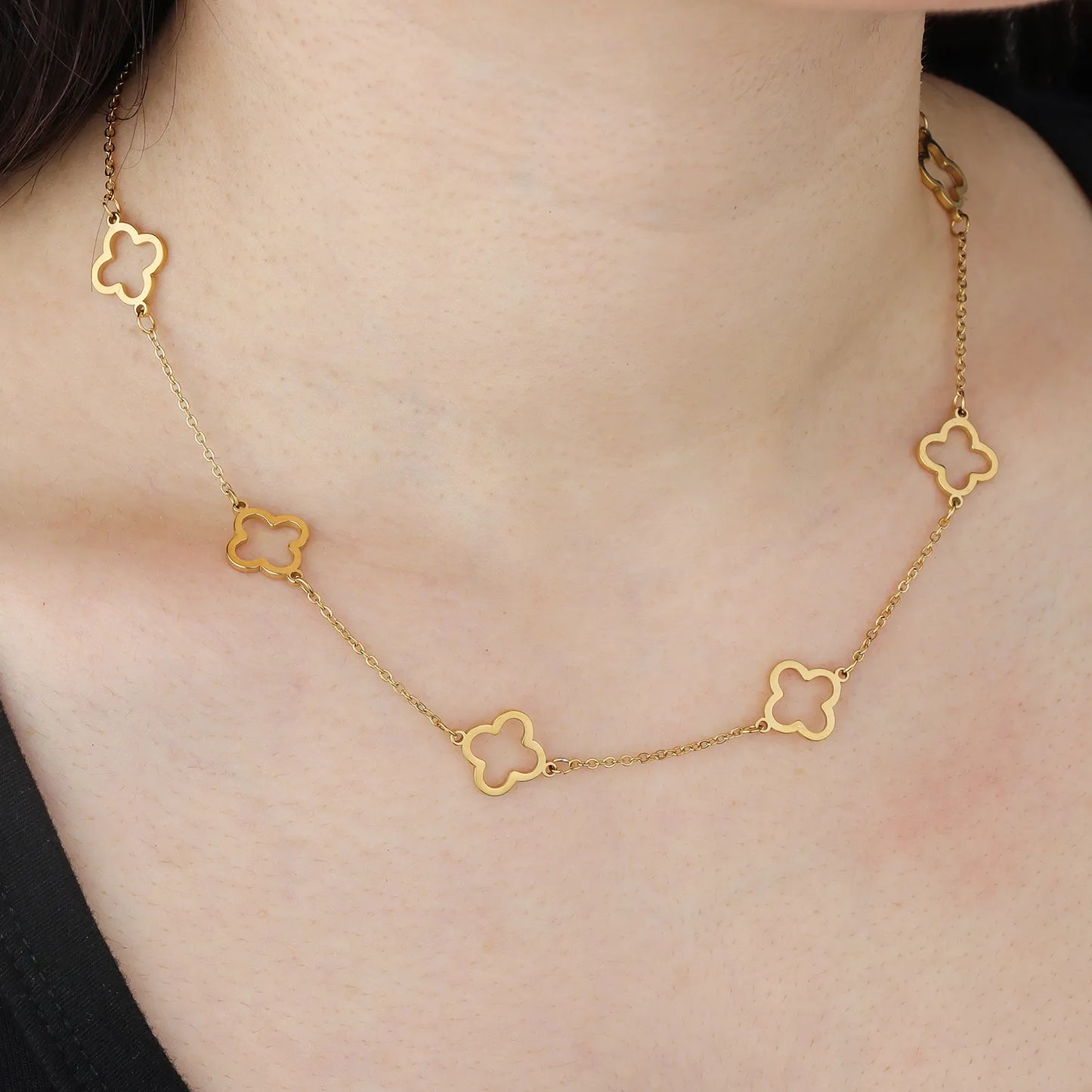 Ajatine gold clover necklace, hollow four leaf clover design