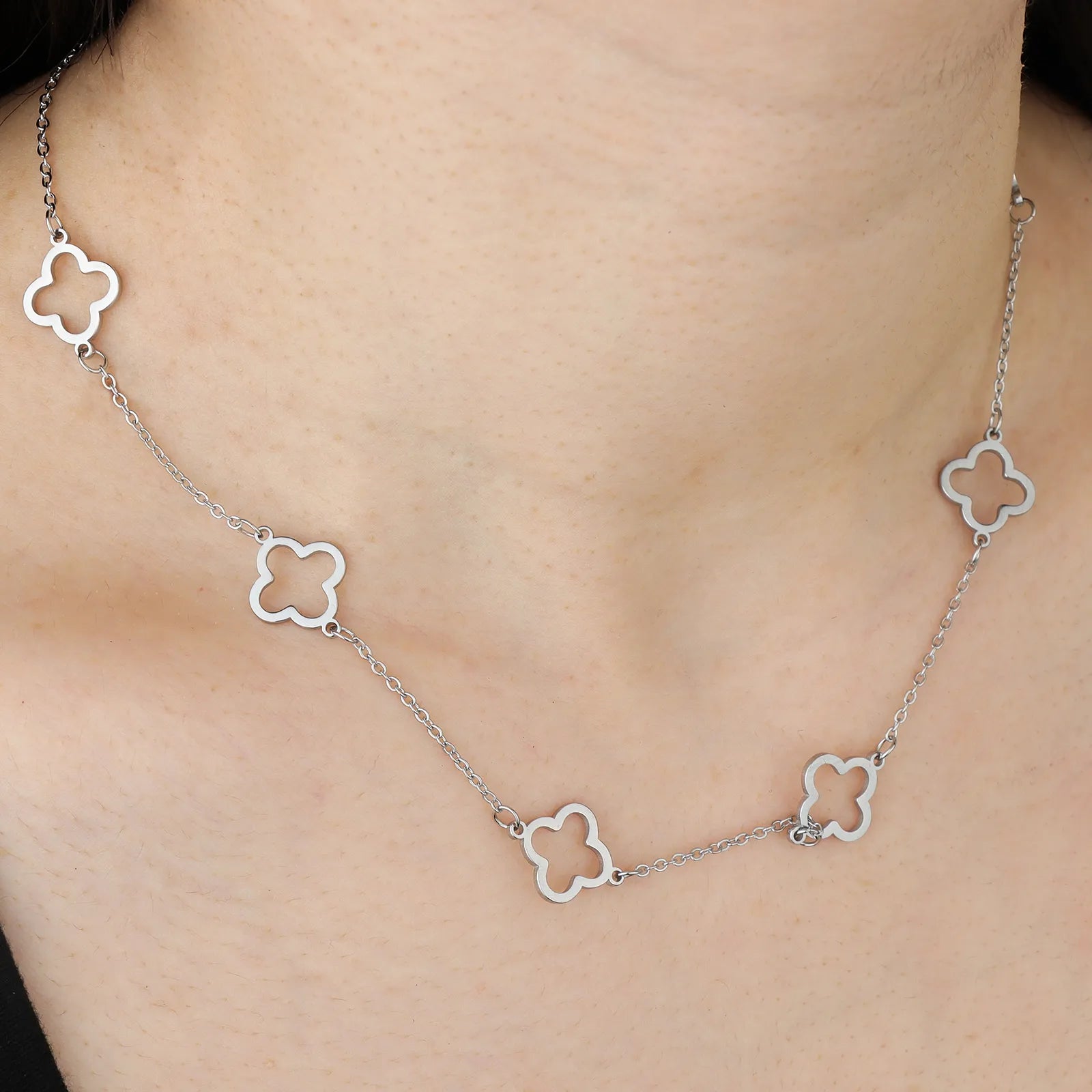 Ajatine silver clover necklace, hollow four leaf clover design