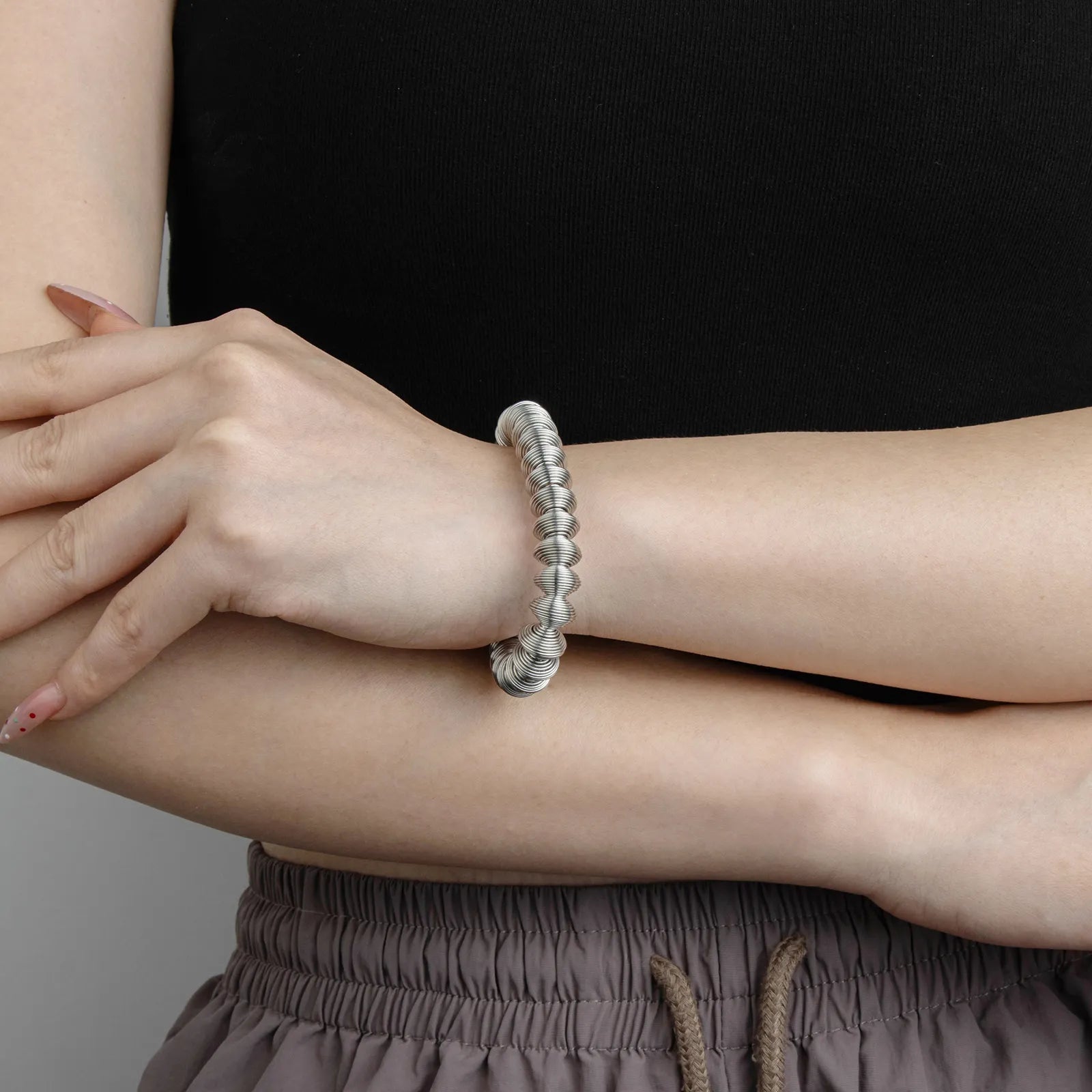 Ajatine silver bracelet with textured, unique design, suitable for daily and party wear