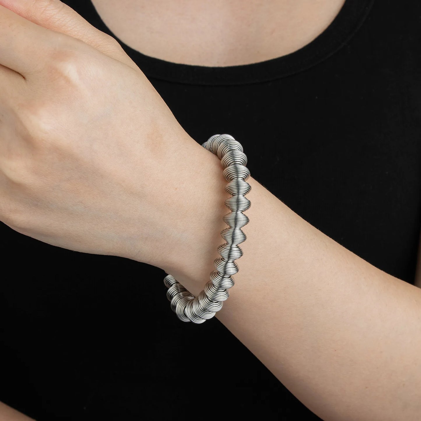 Ajatine silver bracelet with textured, unique design, suitable for daily and party wear