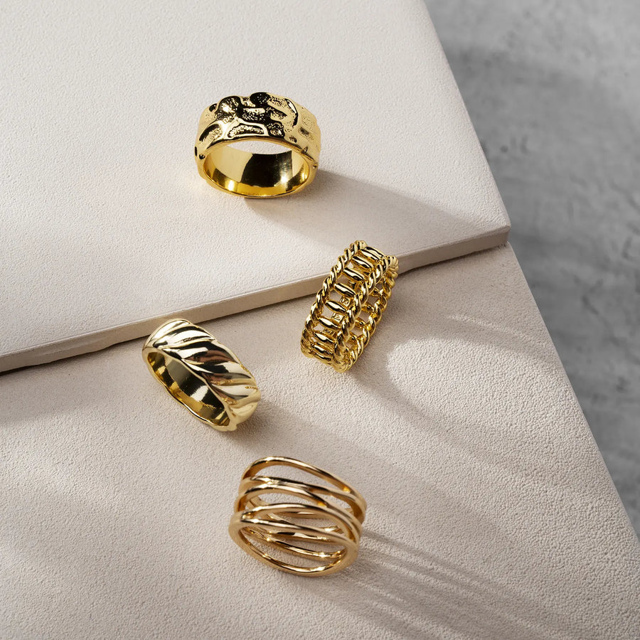 Gold rings arranged on a jewellery tray
